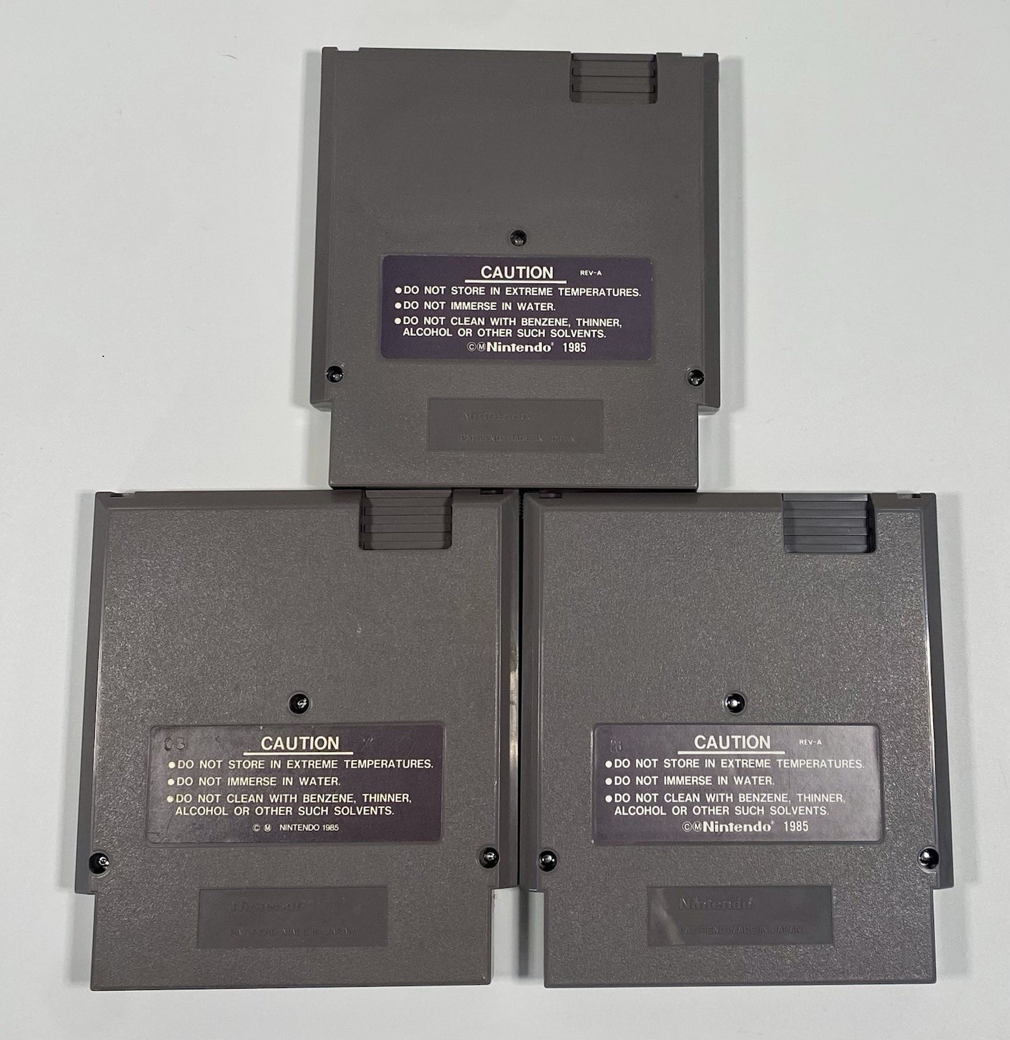 NES 3 Game Lot Bundle. Mario/Duck Hunt, Top Gun, John Elway’s Quarterback, Works