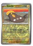 Stunfisk Reverse Holofoil NM (Surging Sparks 064/191)